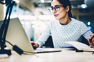 Woman working on managing website