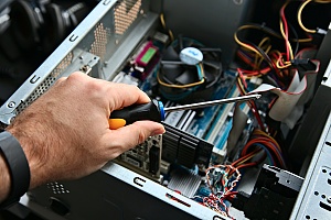 preventative maintenence performed on computer hardware by an it professional in managed it services