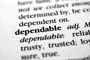 zoomed in view of the definition of the word dependable which is characteristic of a good managed it services company