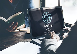 data backup shown on a business laptop as a part of managed it services in alexandria va