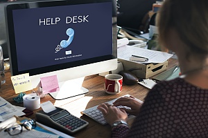 the words help desk on a computer screen showing help received from managed it services