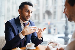 it consultant in a suit in fairfax va providing expert guidance to a client