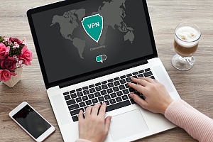 person installing a VPN to protect their data while working remotely at home