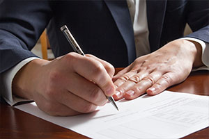 man looking over documents