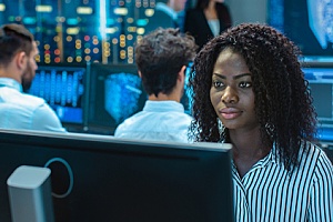 an IT security services professional monitoring a network remotely