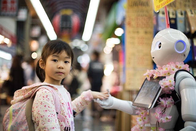 girl interacting with a robot / artificial intelligence / AI