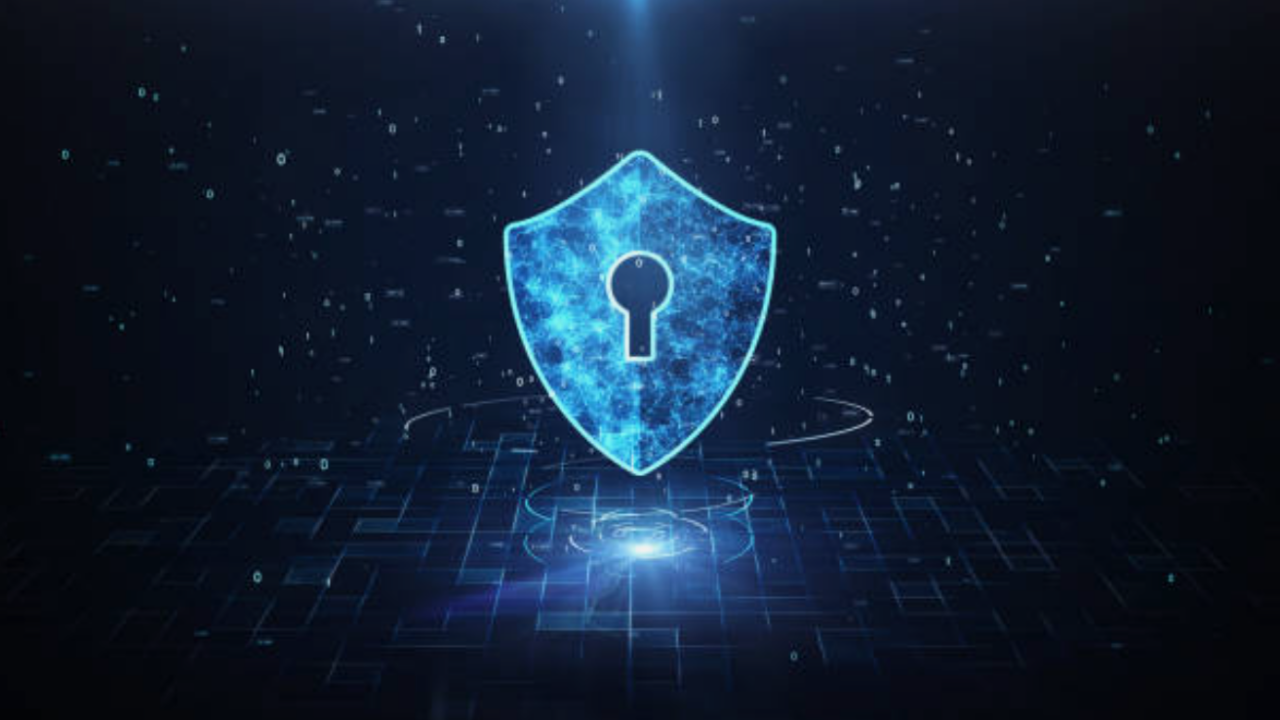 An image of a shield with a lock symbol representing API security and protection against cyber threats.