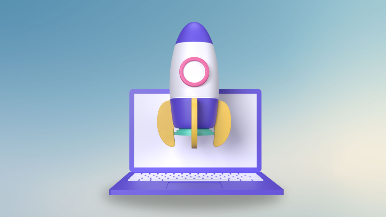 A laptop with a rocket on screen, symbolizing start up