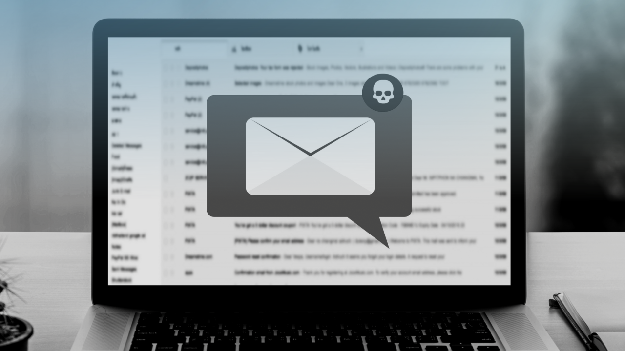 A laptop showing email signature with potential security risks
