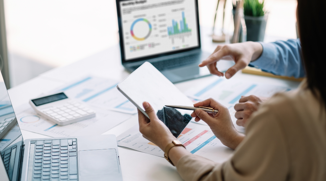 A business team is being proactive by reviewing cybersecurity metrics on a dashboard