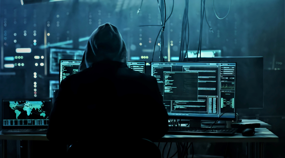 A visual of a hacker using AI-generated code or interfaces, a concern for cybersecurity